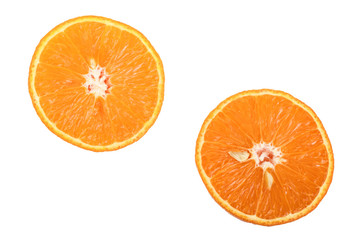 Two slices of tangerine isolated on white background. Top view. Flat lay