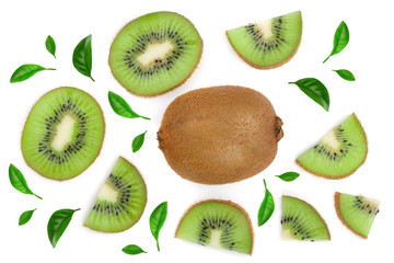sliced kiwi fruit decorated with green leaves isolated on white background. Flat lay pattern. Top...
