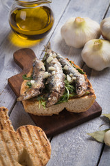 Sardine fish sandwich with garlic and olive oil