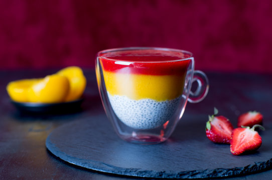 Almond milk chia seeds pudding with strawberry peach topping