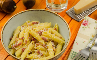 Pasta carbonara. Italian pasta with bacon. Penne alla carbonara