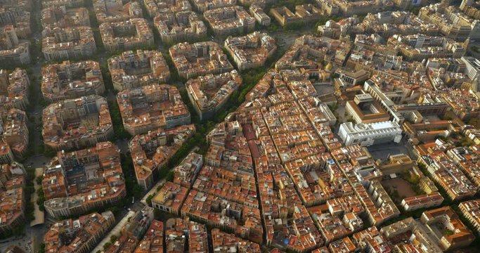 Aerial view of Barcelona Eixample residential district and old town narrow streets, Spain