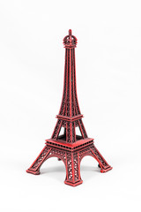 Fototapeta na wymiar Red Eiffel Tower model, isolated on white background