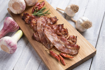 Slices of fried bacon