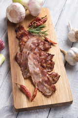 Slices of fried bacon