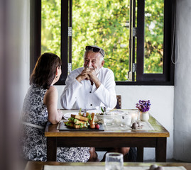 Mature couple having lunch at a restaurant