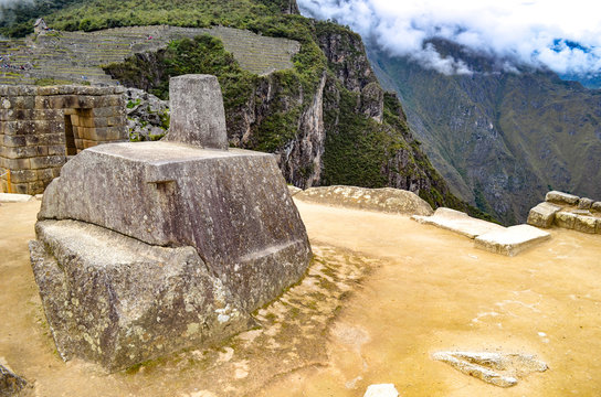 The Intiwatana (or Inti Watana), a ceremonial stone located within the Machu Picchu archaeological site. Cusco, Peru.