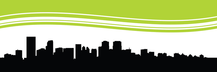 Fototapeta premium Skyline silhouette of the downtown financial district of Calgary, Alberta, Canada.