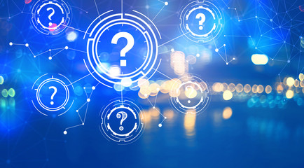 Question Marks with blurred city lights at night