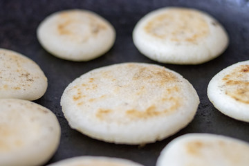 Cooking arepas in the pan