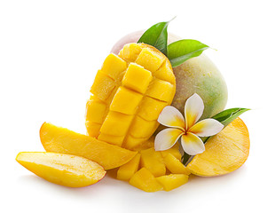 Mango fruit with mango cubes and slices. Isolated on a white background.