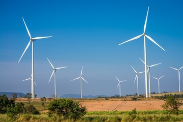 Wind turbines generating electricity with blue sky
