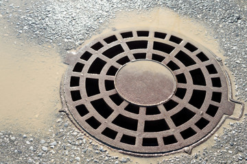 Rain Manhole Cover with Dirty Water