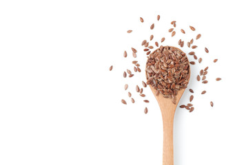 Flax seeds in a wooden spoon on white background
