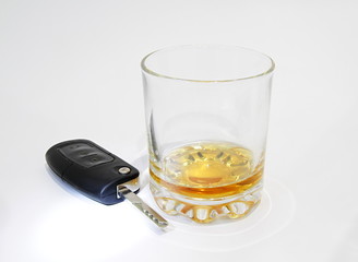 whisky glass with car keys stock photo