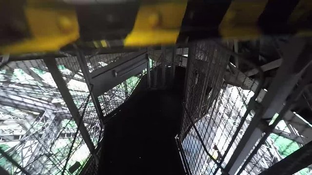 A shot walking down the stairs of the Eiffel Tower.