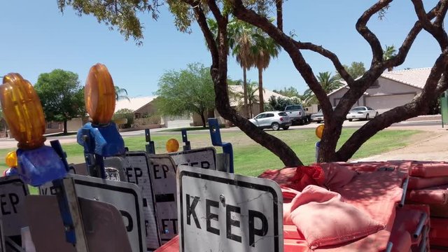 Traffic Signs Gathered Together on a Desert Road