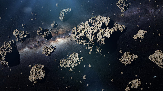 a group of asteroids in front of the Milky Way galaxy