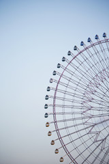 Ferris wheel with sky background 