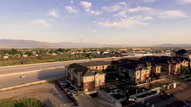 Aerial view of apartment buildings and the I-15 highway in Orem, Utah by the UVU Campus
