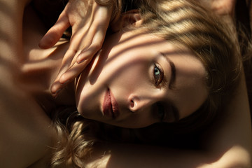 woman lying in sunlight