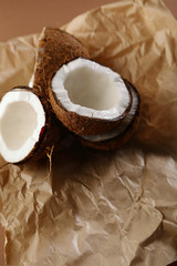 Fototapeta na wymiar Half of Fresh coconut on paper