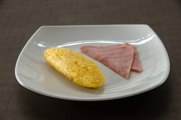 American breakfastwith omelet egg and ham
