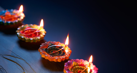Diya lamps lit during celebration