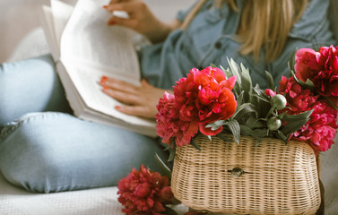 girl on the couch reading books