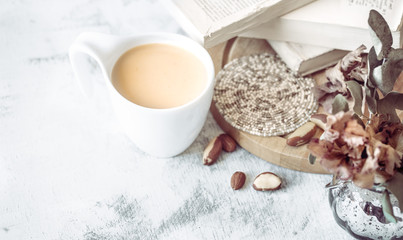 still life of a book and a cup of coffee