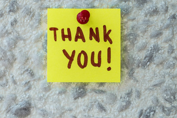 THANK YOU  text written on sticky note on gray background