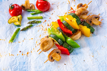 vegetarian skewers white mushrooms, peppers and zucchini for barbecue