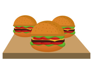 delicious hamburgers in table wooden vector illustration design