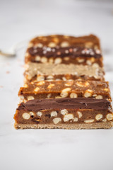 Various of vegan homemade chocolate candy bars. Healthy lifestyle and raw vegan food concept.