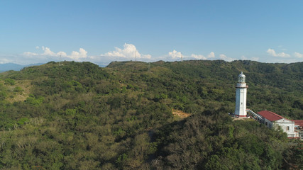 Aerial view of Lighthouse on hill. Cape Bojeador Lighthouse, Burgos, Ilocos Norte, Philippines.