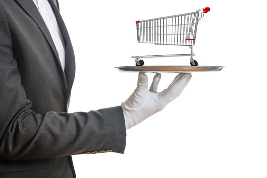 Waiter Holding A Silver Platter With An Empty Shopping Trolley, On White Background. 3d Illustration