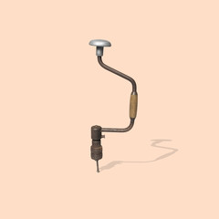 Old drill on light brown background (Clipping path)