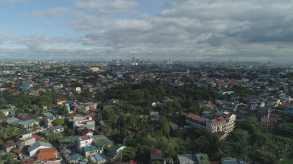 Aerial view of Manila city with skyscrapers and buildings. Philippines, Luzon. Aerial skyline of Manila.