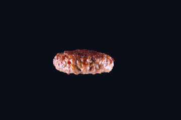 Fried fresh large beef burger isolated on white background. Grilled burger cutlet isolated on black