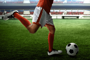 Soccer player kicking