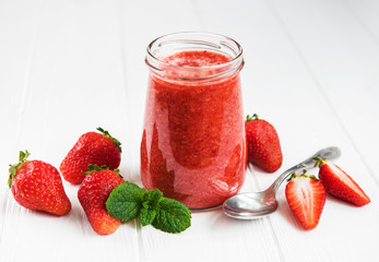 Jar with strawberry smoothie