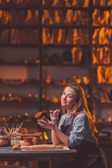 Smiling young woman in studio