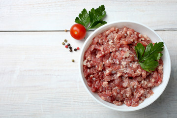 Minced meat in a white bowl