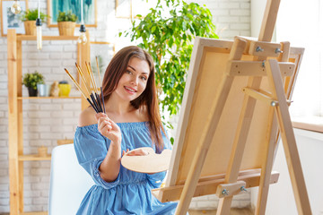 Creative woman working in art studio