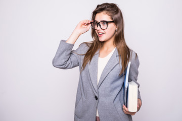 Portrait of smiling business woman with paper folders, isolated on white background