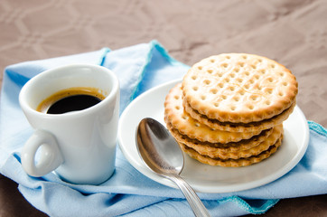 cup of coffee with biscuits