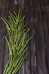 on a wooden table vegetables asparagus