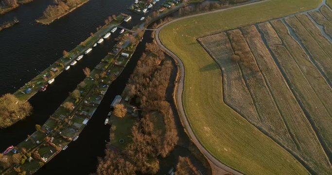 Aerial view of houses with boats on the lake at Loosdrecht Kalverstraat, The Netherlands.