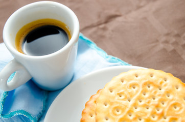 cup of coffee with biscuits