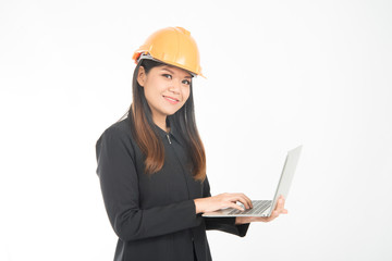 Asian engineer woman working hard on notebook